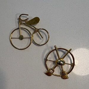 Vintage Gold Tone Bicycle and Curling Brooch Set